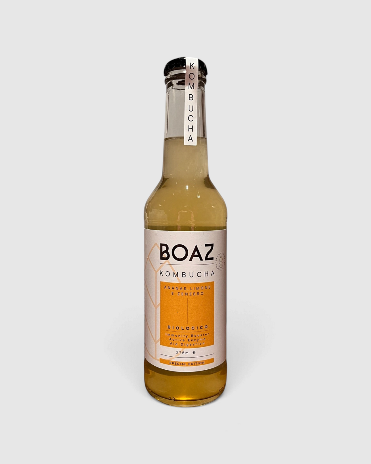 Bottiglia di Kombucha Bio Boaz al gusto ananas, limone e zenzero venduta da Raró Shop, bevanda fermentata da 275 ml.